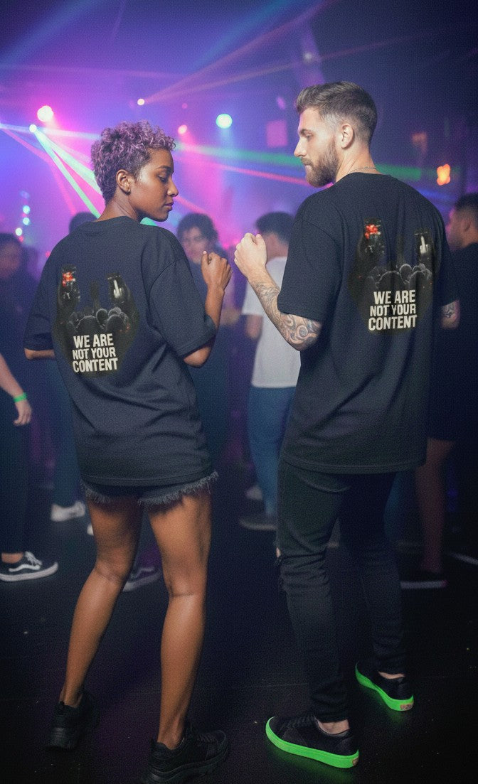 Oversized Tee — "We Are Not Your Content" Social Justice Graphic Shirt